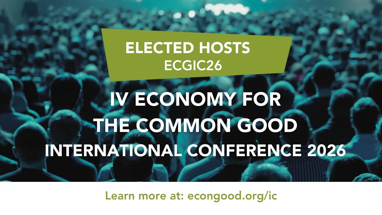 Crowd of people in a large auditorium with text announcing the IV Economy for the Common Good International Conference 2026. Elected hosts are ECGIC26. Learn more at staging.econgood.org/ic.